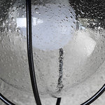 Nautical Black 1-Light Metal Cage Seeded Glass Outdoor Wall Light