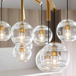 Sedona Double Chandelier, 8-Light, LED, Aged Brass, Transparent Glass Orb, 24.5"W (700SDNMPL2CR-LED927 70E7GUX)