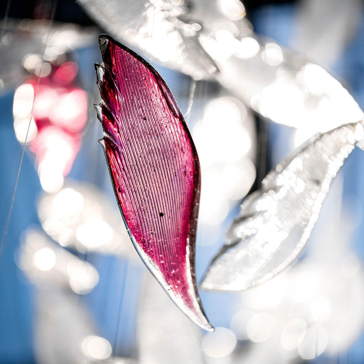 DIY Flying Glass Feather Chandelier