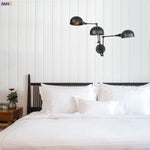 Loft Antique Edison 3-Head Black Wall Sconce Swing Arm Light