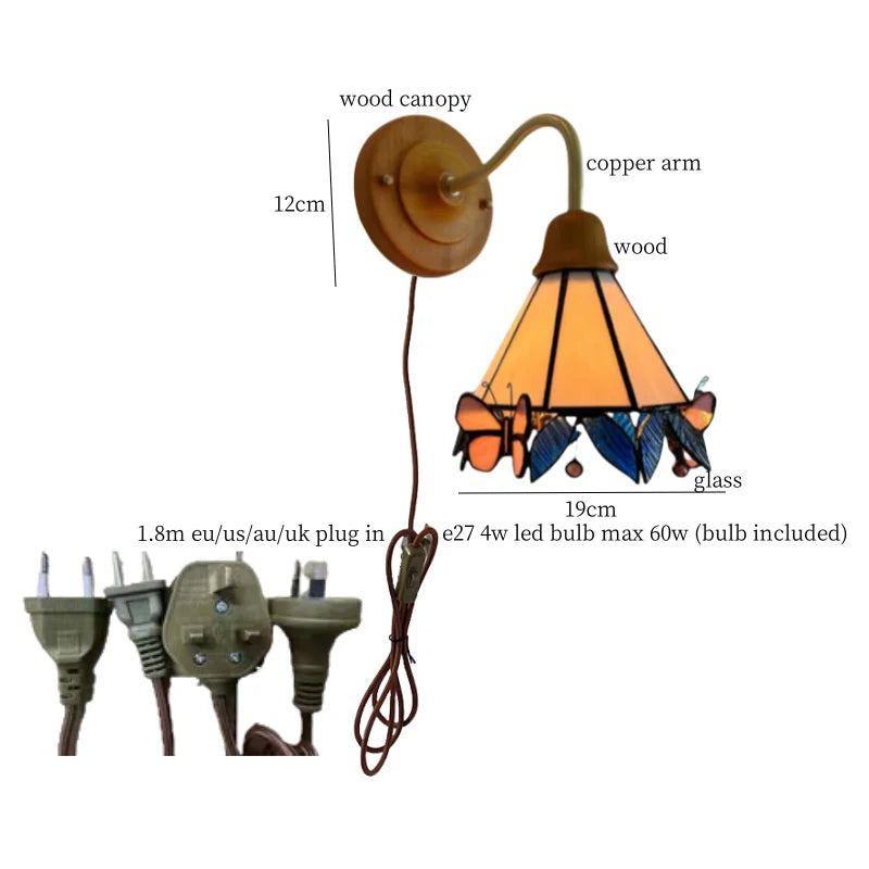 Butterfly Glass LED Wall Light with Copper Arm for Home Decor.