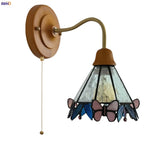 Butterfly Glass LED Wall Light with Copper Arm for Home Decor.