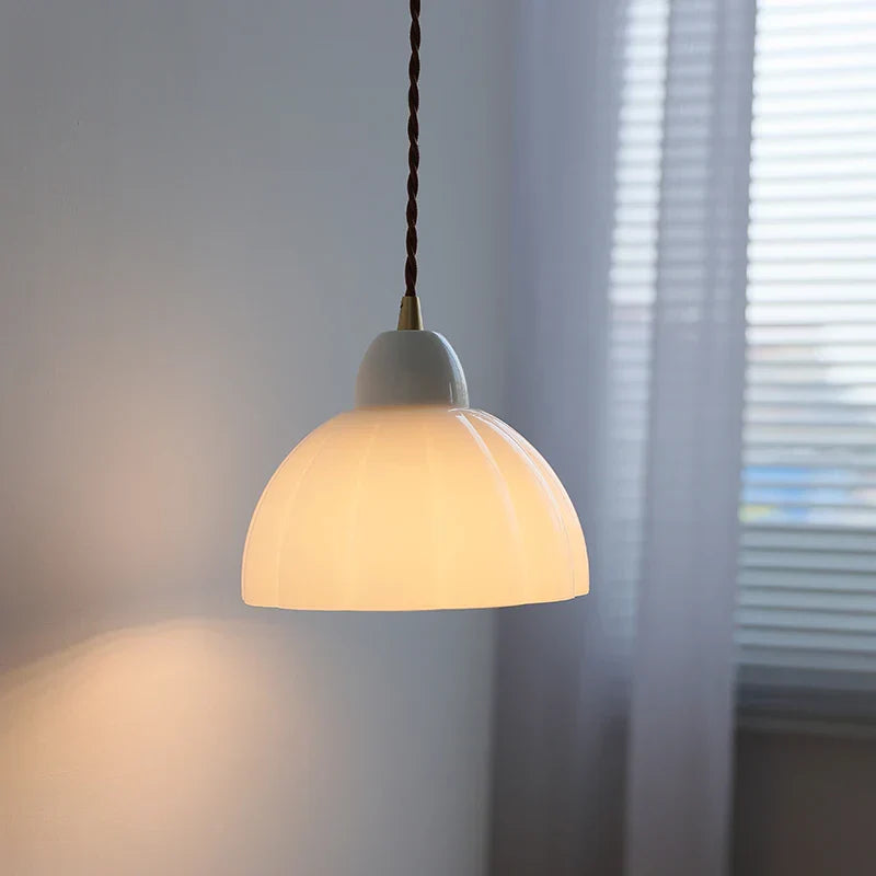 Modern Nordic Glass Pendant Light with Ceramic Socket for Home Decor.