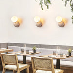 Afralia Yellow Travertine LED Wall Sconce with Nordic Modern Glass Design