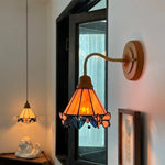 Butterfly Glass LED Wall Light with Copper Arm for Home Decor.
