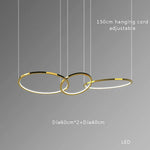 Modern Minimalist Round Dining Table with Gold Chandeliers