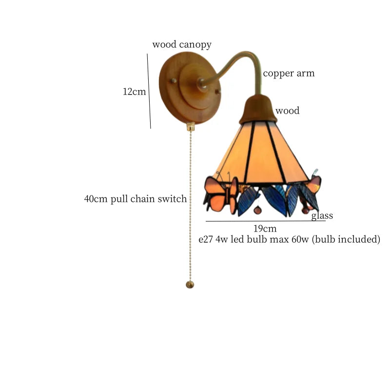 Butterfly Glass LED Wall Light with Copper Arm for Home Decor.