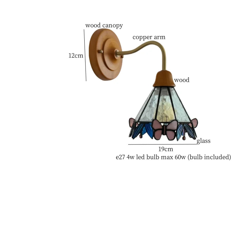 Butterfly Glass LED Wall Light with Copper Arm for Home Decor.
