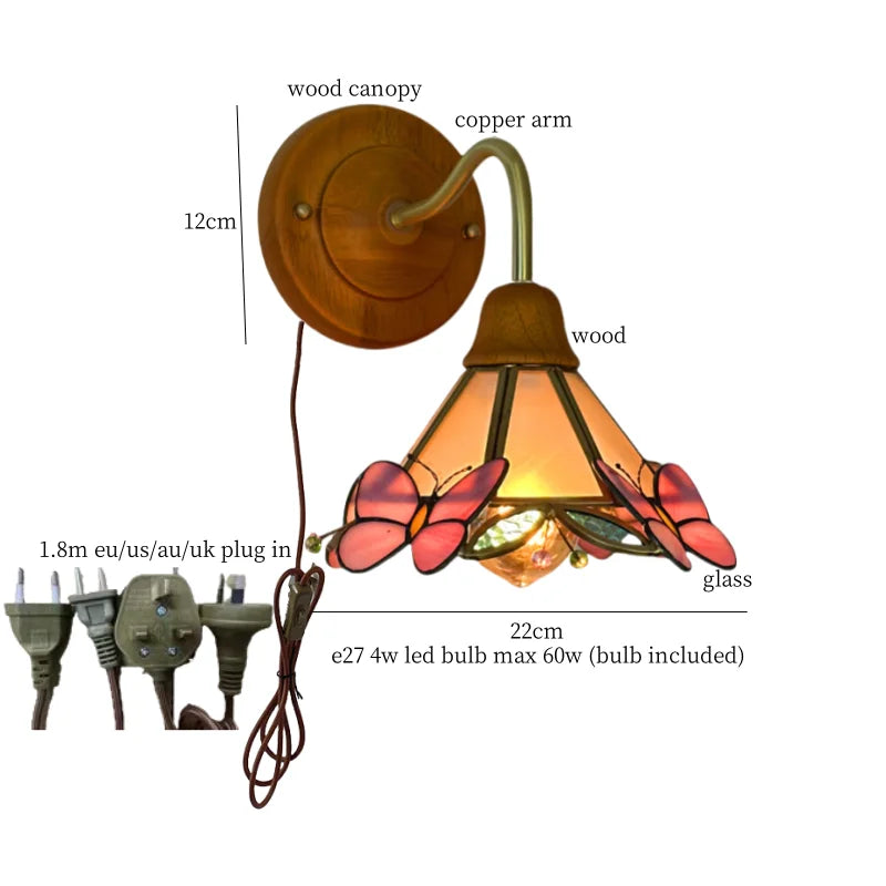 Butterfly Glass LED Wall Light with Copper Arm for Home Decor.