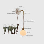 Afralia™ Adjustable LED Wall Sconce Lamp Stripe Ceramic Copper Mirror Bedside