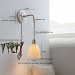 Afralia™ Copper Ceramic LED Wall Light with Pull Chain Switch for Living Room Decor.