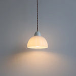 Modern Nordic Glass Pendant Light with Ceramic Socket for Home Decor.