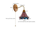 Butterfly Glass LED Wall Light with Copper Arm for Home Decor.