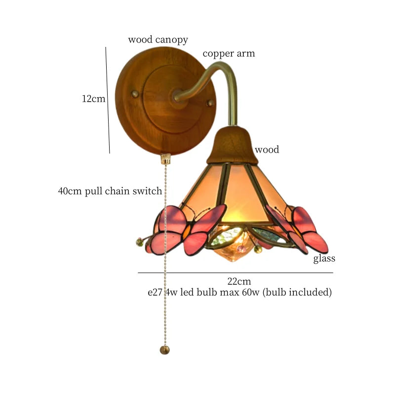 Butterfly Glass LED Wall Light with Copper Arm for Home Decor.