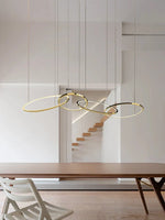 Modern Minimalist Round Dining Table with Gold Chandeliers