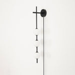 Vertical Globe Plug-in Wall Lamp