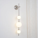 Vertical Globe Plug-in Wall Lamp