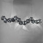 Riddle 64" Wide Integrated LED Linear Chandelier