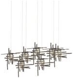 Tura 53.6"W 7-Light Rectangular Bronze Long Pendant w/ Seeded Glass Sh