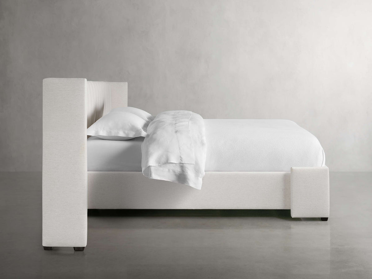 Wyller Channel-Stitched Extended Headboard Bed with Low Footboard