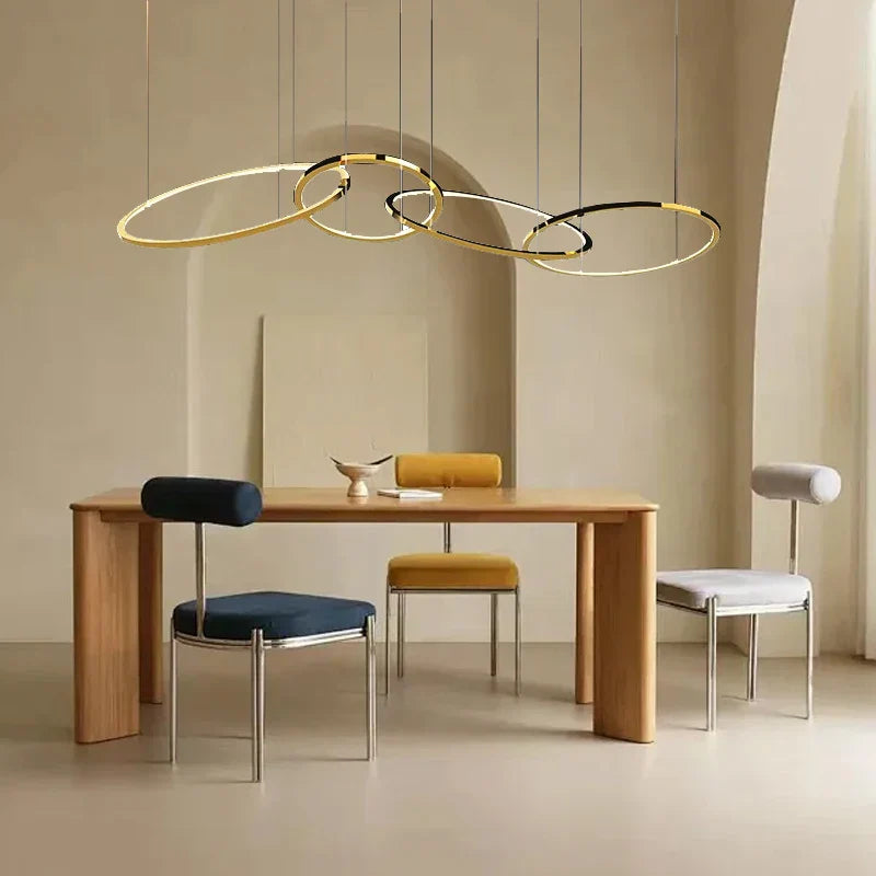 Modern Minimalist Round Dining Table with Gold Chandeliers