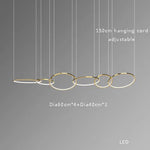 Modern Minimalist Round Dining Table with Gold Chandeliers