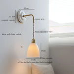 Afralia™ Copper Ceramic LED Wall Light with Pull Chain Switch for Living Room Decor.