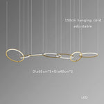 Modern Minimalist Round Dining Table with Gold Chandeliers