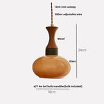 Afralia™ Amber Glass LED Pendant Light for Kitchen Cafe Restaurant Rustic Wood Interior Lighting
