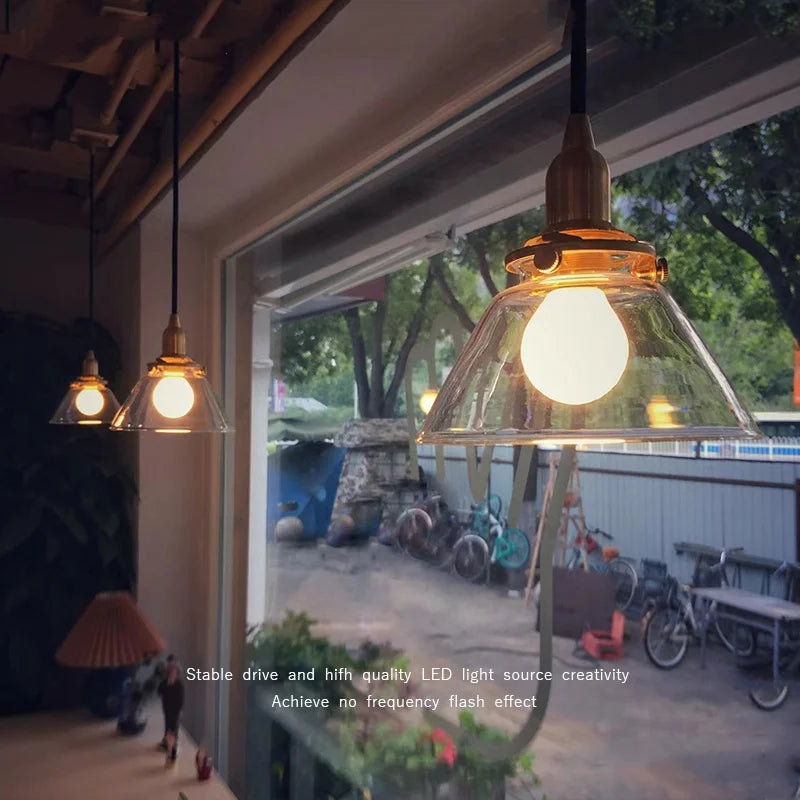 Minimalist Clear Glass Pendant Light Fixture with Copper Socket for Modern Living Space