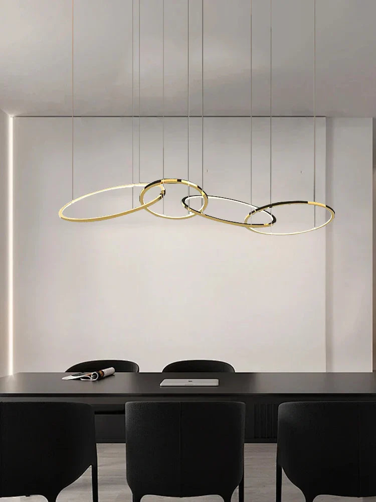 Modern Minimalist Round Dining Table with Gold Chandeliers