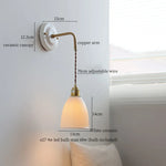 Afralia™ Copper Ceramic LED Wall Light with Pull Chain Switch for Living Room Decor.