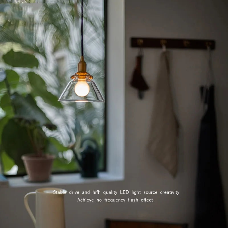 Minimalist Clear Glass Pendant Light Fixture with Copper Socket for Modern Living Space