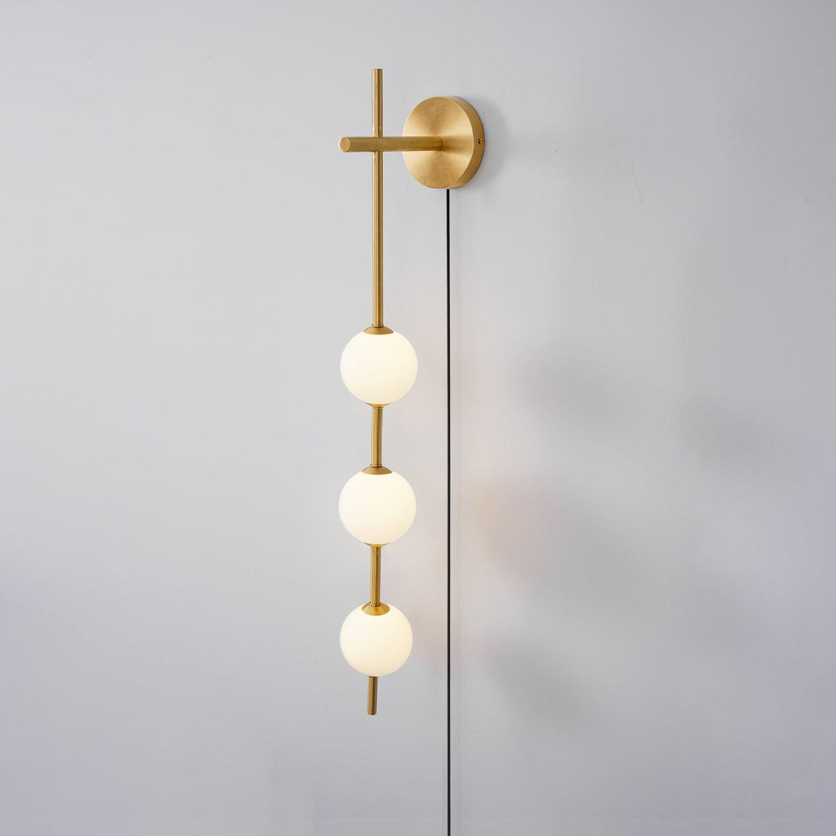 Vertical Globe Plug-in Wall Lamp