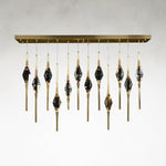 Sprezzatura Twelve-Light 66-Inch Honey Brass Linear Chandelier Ceiling Light